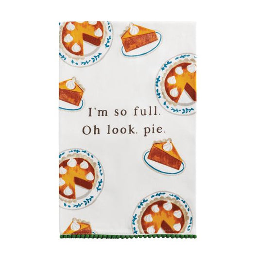 Towel with pie illustrations and text 'I'm so full. Oh look, pie.' on a white background